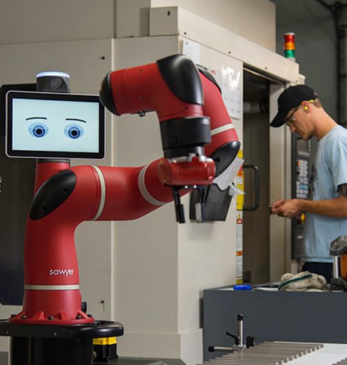 Sawyer, a leading product of our digital marketing client Rethink Robotics, works an assembly line.