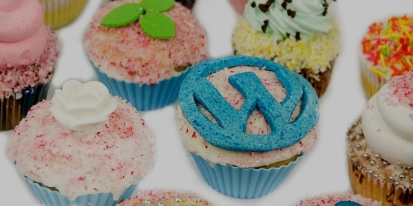 Cupcake With Wordpress Logo Around Other Cupcakes