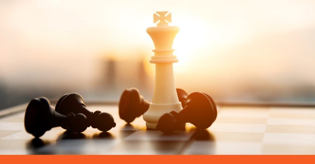 Symbolic Chess game in front of a sunset representing SEO