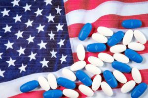Pills on top of USA flag
